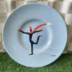 จานตกแต่งลายฉากสเก็ตน้ำแข็งฤดูหนาว